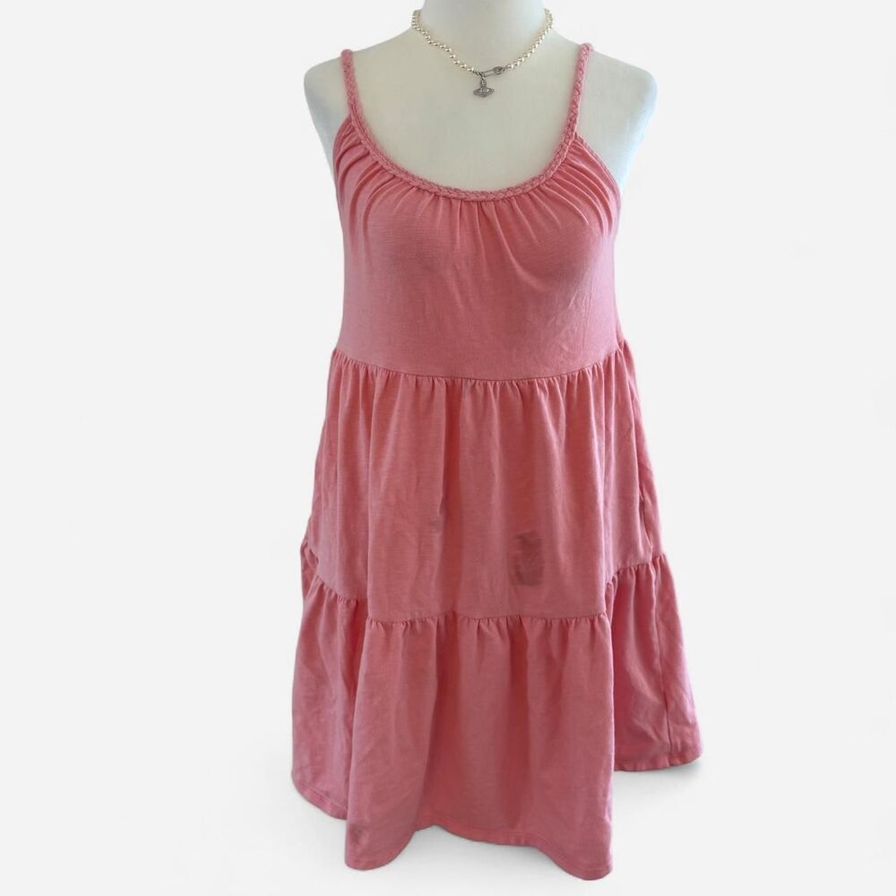 Pink Y2K babydoll dress with braided straps and tiered skirt